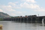 NS 9837 leads a westbound container train over Rockville bridge